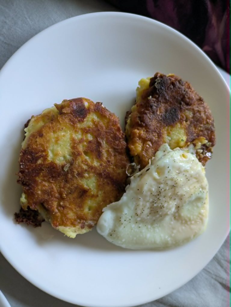 Cheesy Skillet Potato Cakes